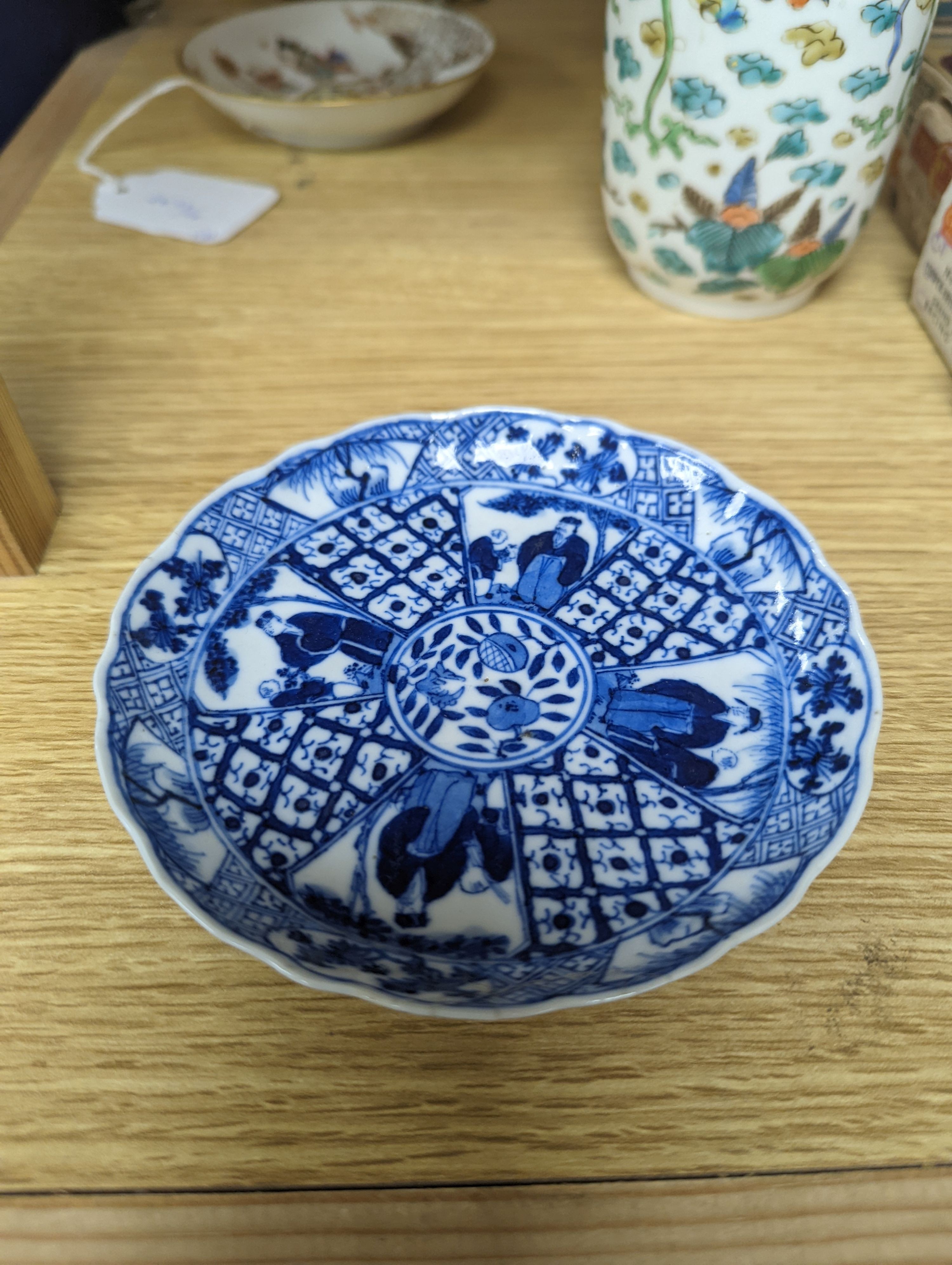 Two Chinese porcelain saucer dishes and an enamelled porcelain vase, 18th century and later, 12.5cm